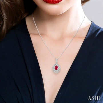 6x4 MM Oval Cut Ruby and 1/8 Ctw Lattice Round Cut Diamond Precious Pendant With Chain in 10K White Gold